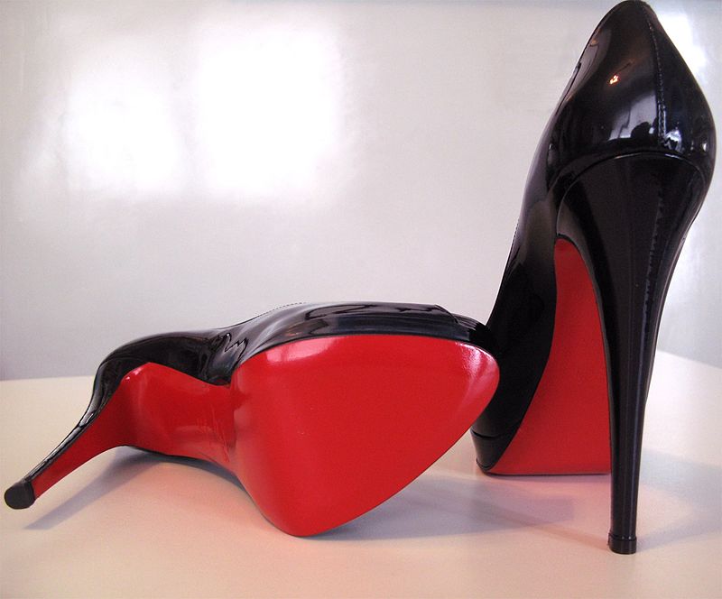 a pair or Christian Louboutin Shoes